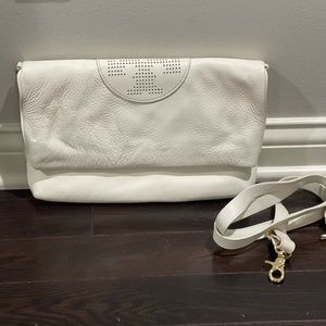 Tory Burch leather handbag/clutch. It’s a white color but a little creamy